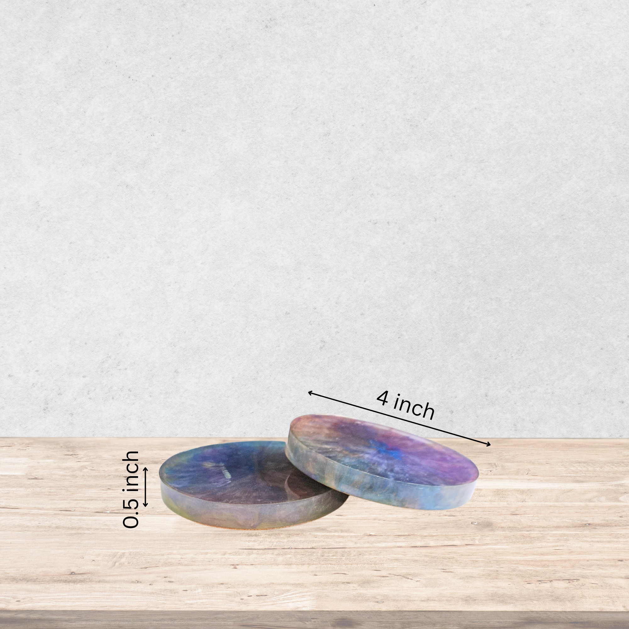 Handmade set of 2 resin coasters with blues, purples, and gold crystal-burst patterns with measurements.