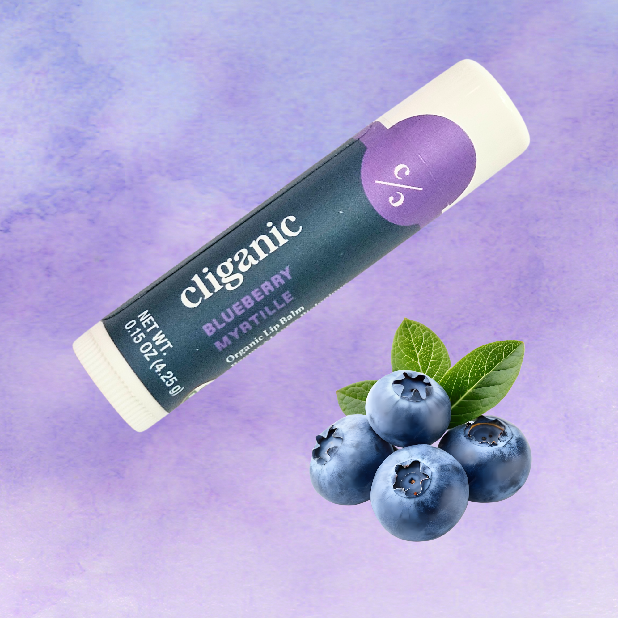 Cliganic Blueberry organic lip balm tube on a purple background surrounded by fresh blueberries and green leaves.