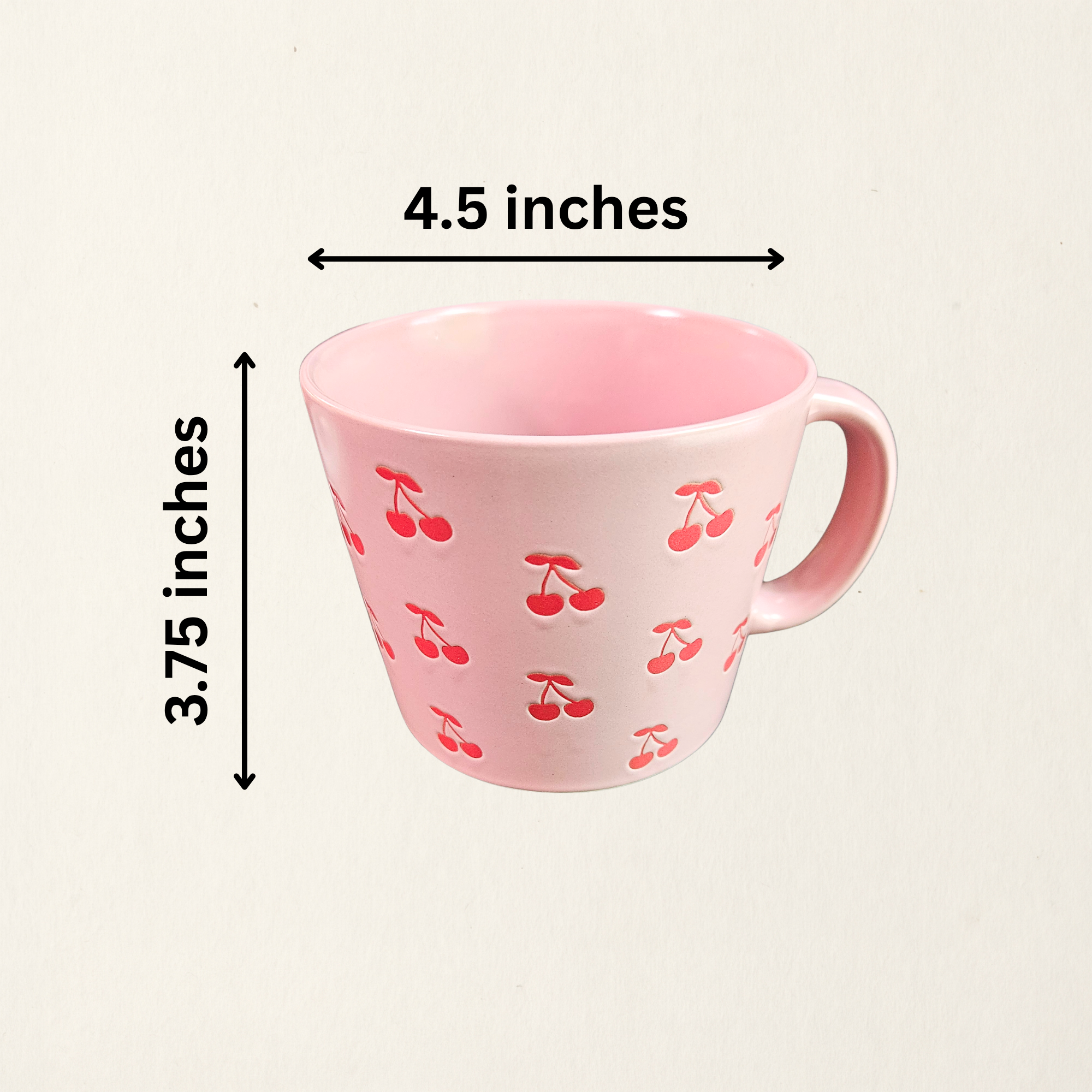 A ceramic soup mug with red cherry designs and a silicone‑sealed plastic lid featuring an adjustable dial and venting hole with measurements, available in pink or white.