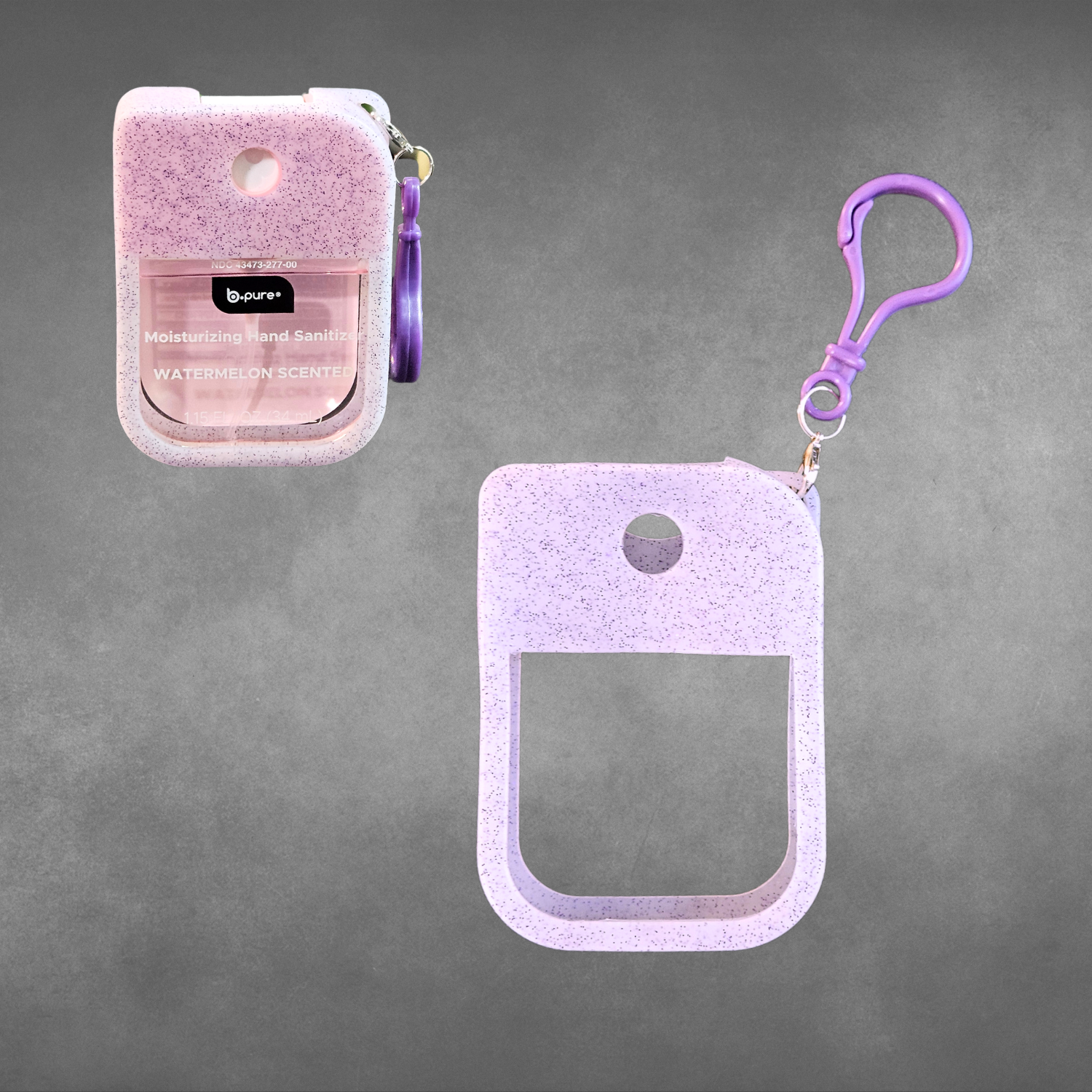 Translucent with purple sparkles hand sanitizer holder with clip on a gray background