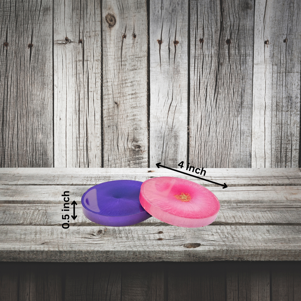 Two handmade resin coasters in pink and purple with radiant crystal‑burst patterns on a dark background with measurements.