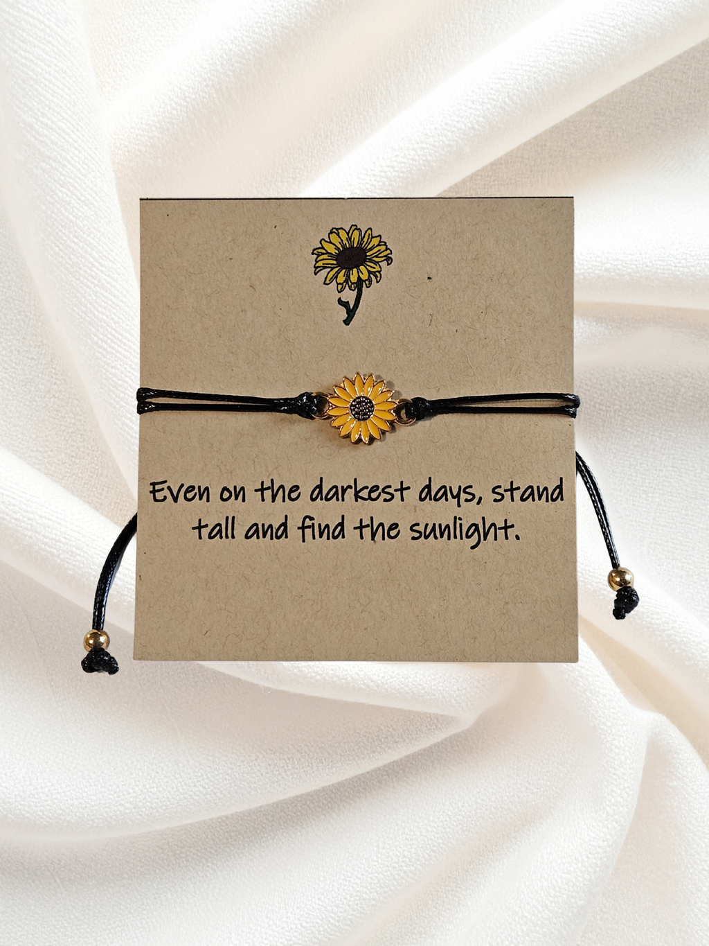 adjustable black wax rope bracelet with sunflower charm and inspirational saying for curated gift boxes